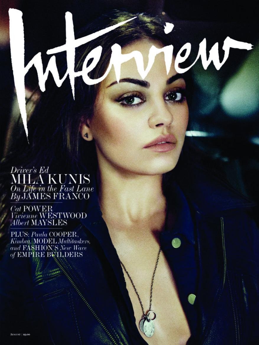 Close-up magazine cover featuring Mila Kunis wearing a black jacket and necklace, with the 'Interview' logo displayed prominently.