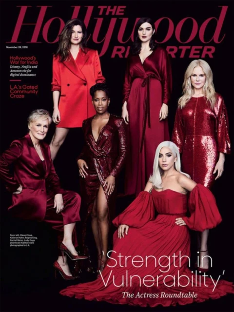 Magazine cover featuring six women including Glenn Close, Lady Gaga, and Nicole Kidman in red dresses against a dark background.
