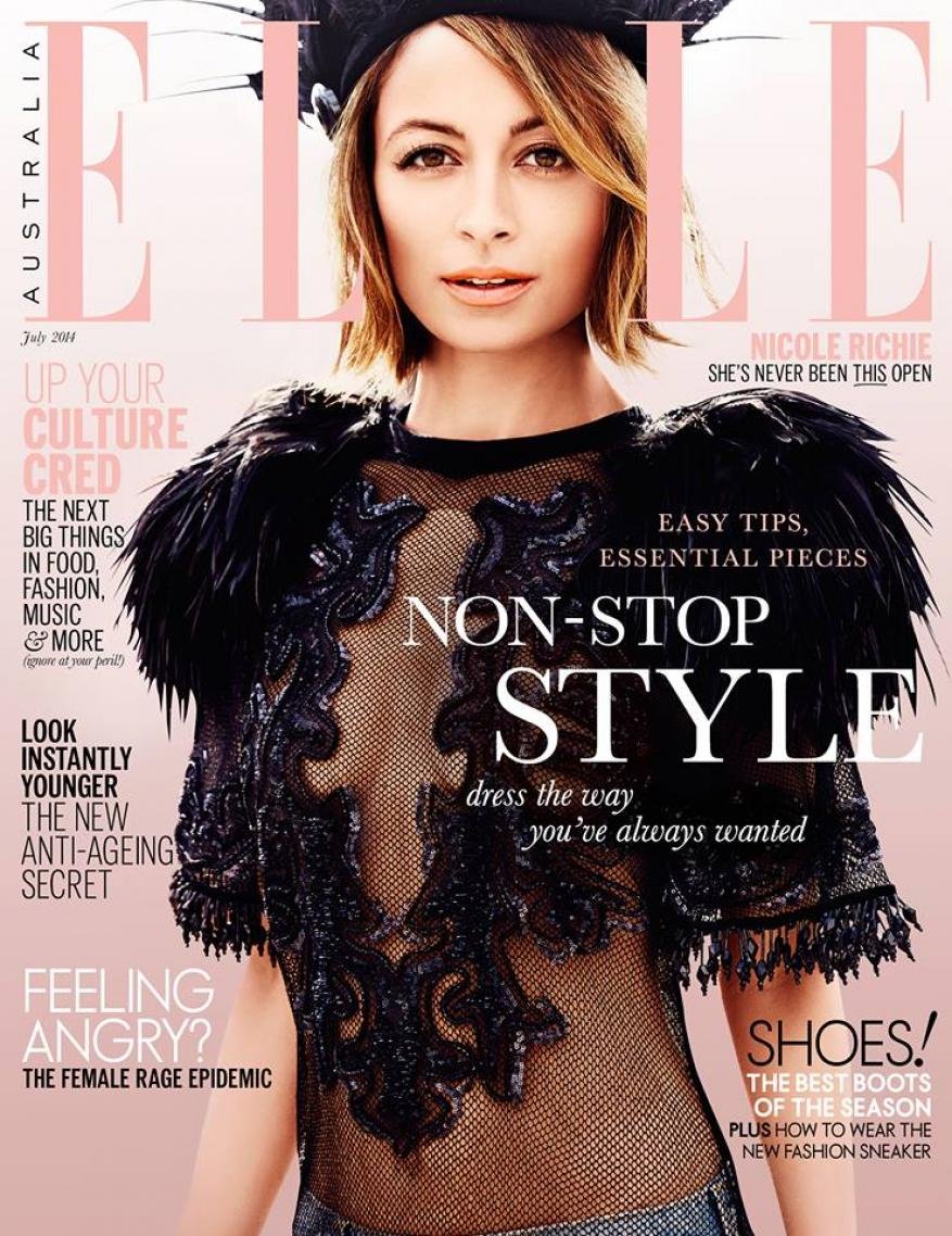 Nicole Richie wearing a black feathered lace top and dark cap for an Elle Australia magazine cover.