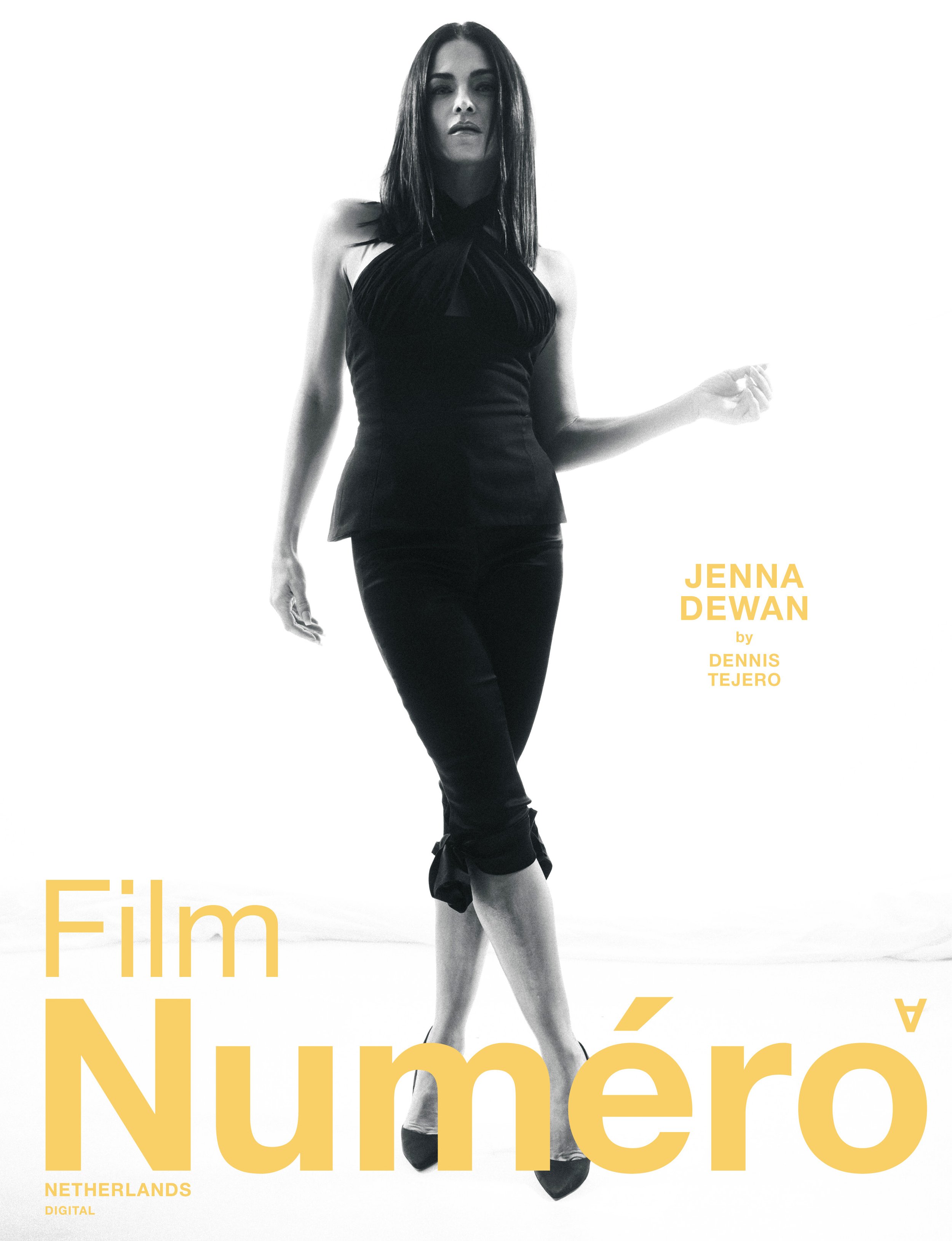 Jenna Dewan poses indoors wearing black top and pants in high key fashion shot for Numero magazine against bright white backdrop.