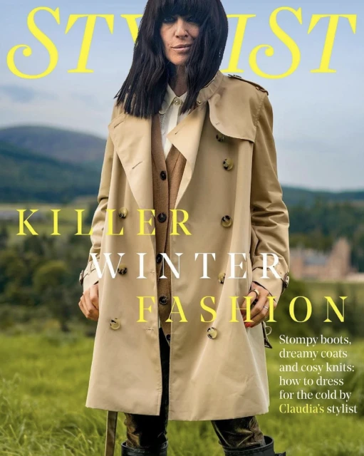 Fashion magazine cover featuring a stylish woman in a trench coat, with text reading 'Killer Winter Fashion' against a scenic backdrop.