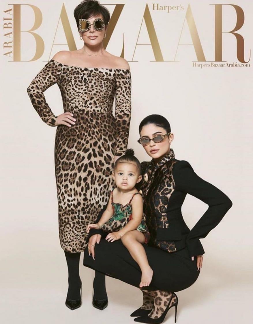 Harper's Bazaar Arabia cover featuring Kris Jenner in a leopard-print dress, Kylie Jenner in a black suit, and a child in a patterned dress.