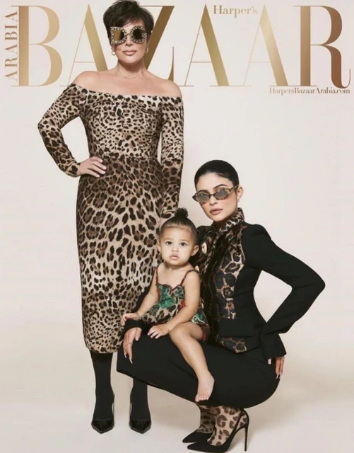 Harper's Bazaar Arabia cover featuring Kris Jenner in a leopard-print dress, Kylie Jenner in a black suit, and a child in a patterned dress.
