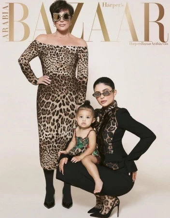 Harper's Bazaar Arabia cover featuring Kris Jenner in a leopard-print dress, Kylie Jenner in a black suit, and a child in a patterned dress.