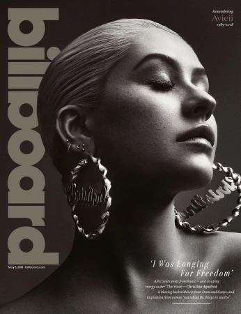 Billboard magazine cover featuring Christina Aguilera in a close-up shot, with a focus on her face, jewelry, and magazine branding.