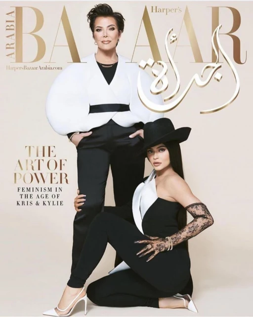 Harper's Bazaar cover featuring Kris Jenner and Kylie Jenner in black and white outfits with gold lettering and a light beige background.