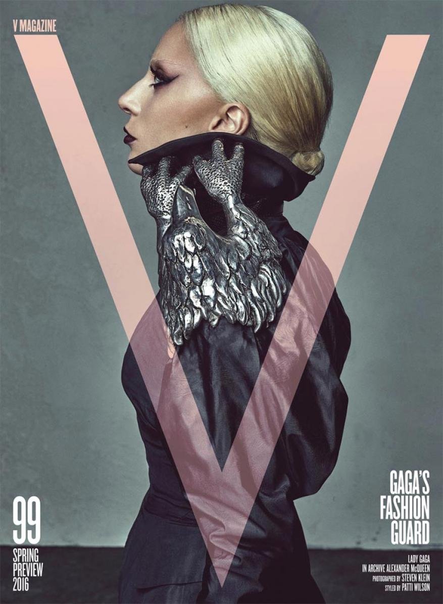 Lady Gaga poses in profile on the cover of V Magazine. The image features a pale color palette, high-fashion styling, and gothic makeup.