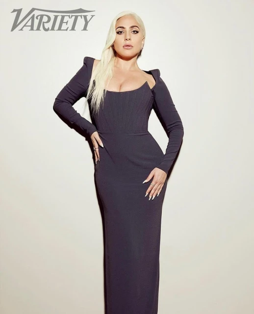 Celebrity portrait of Lady Gaga in a formal black gown posing in front of a neutral background with the Variety magazine logo visible.