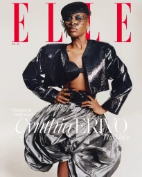 Cynthia Erivo on Elle magazine cover wearing black sequin jacket and silver bubble skirt with veiled hat