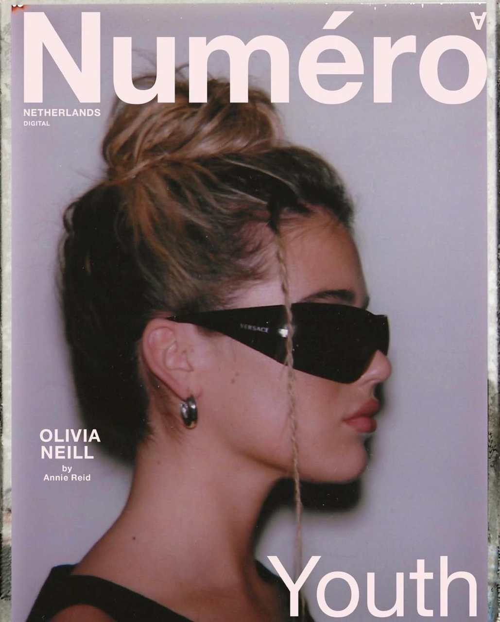 Magazine cover featuring a young woman with dark sunglasses. Text includes 'Numero' and 'Youth'. Fashion and beauty elements dominate.