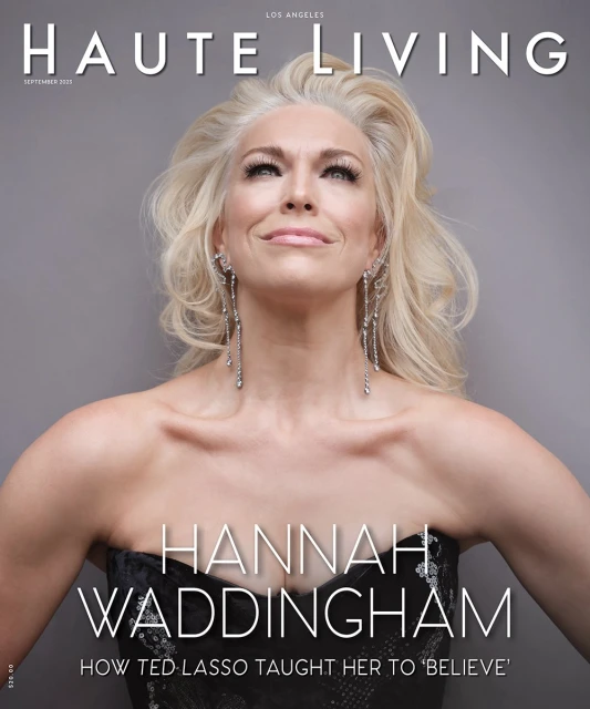 Magazine cover featuring Hannah Waddingham with blonde hair, wearing a black dress with silver dangling earrings against a grey backdrop.