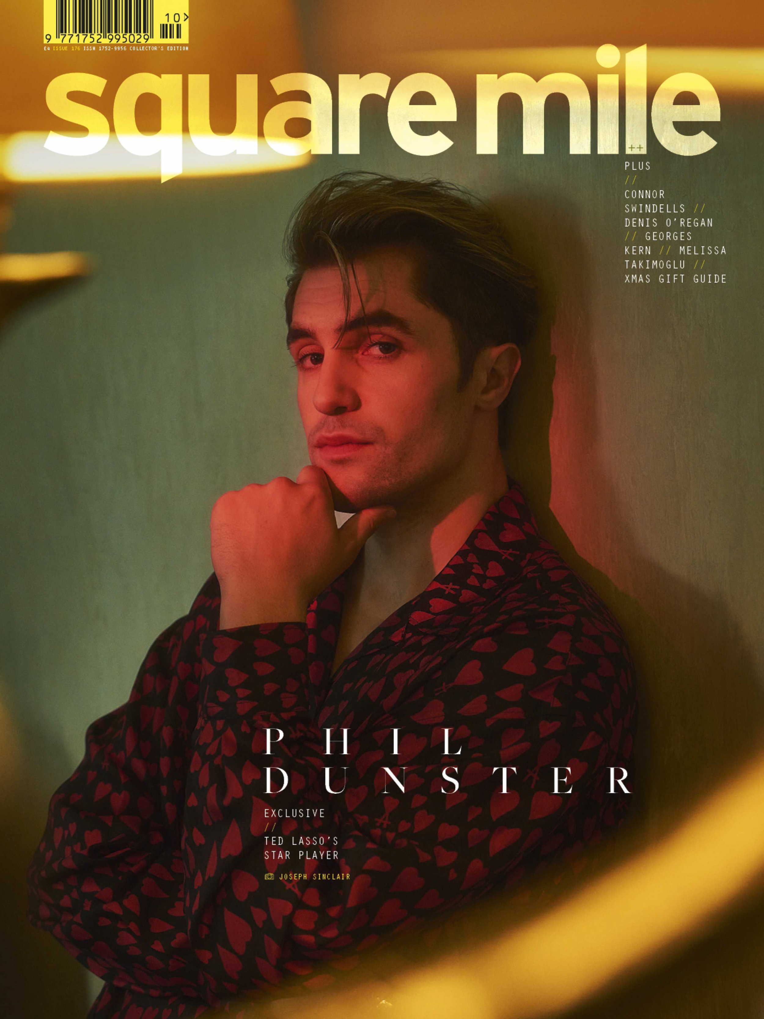 Magazine cover featuring Phil Dunster in a patterned robe against a muted background with warm lighting and "square mile" title.