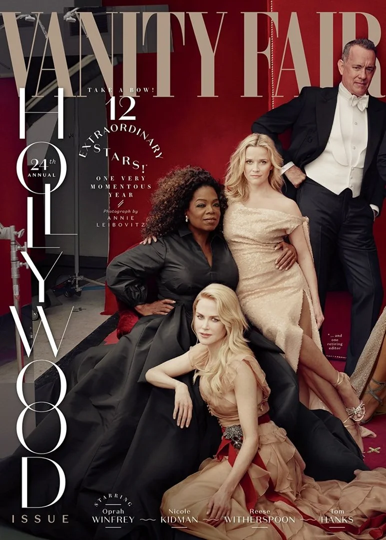 Magazine cover featuring Oprah Winfrey, Nicole Kidman, Reese Witherspoon, and Tom Hanks in formal wear on a red background. Vanity Fair logo.