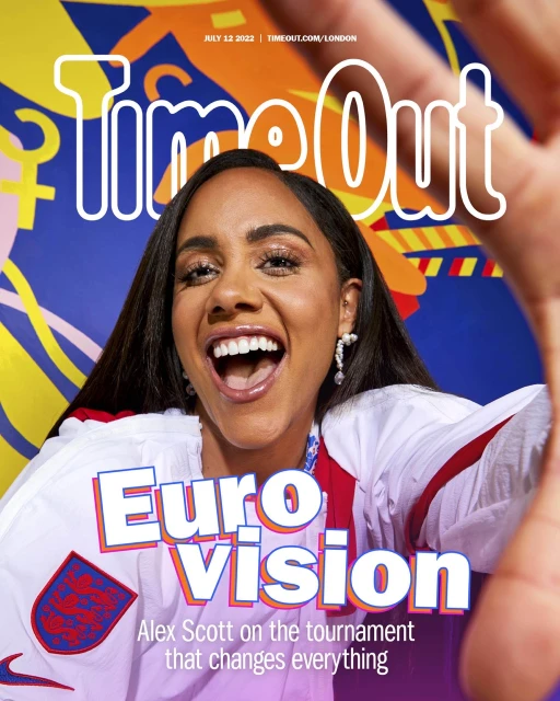 Alex Scott on Time Out magazine cover, July 12 2022. Close-up of smiling female with EuroVision text and geometric background.