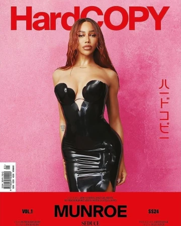 Magazine cover featuring a woman in a black dress against a pink backdrop, with red text reading 'HardCOPY' and model name 'MUNROE'.