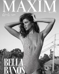 Black and white magazine cover featuring a woman wearing a glittering halter-neck swimsuit with utility poles in the background.