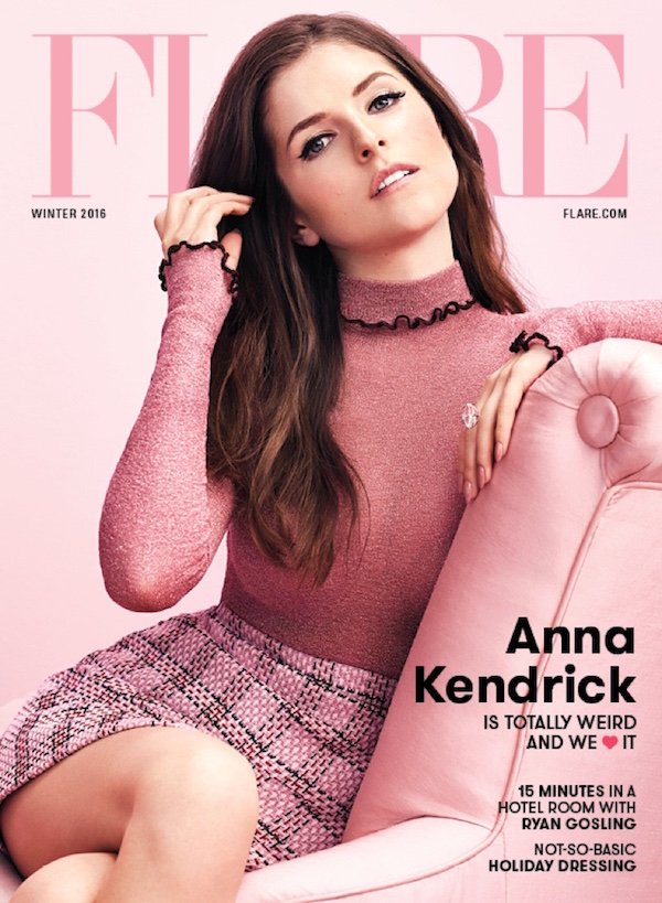 Magazine cover featuring Anna Kendrick in pink, seated on a pink tufted chair against a pink background. She wears a pink turtleneck sweater and skirt.