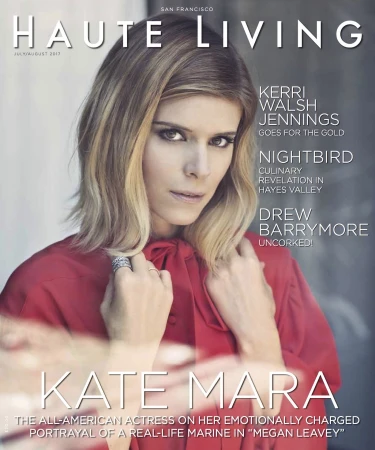 Magazine cover featuring actress Kate Mara in a red blouse. The cover includes text such as 'Haute Living' and other article titles.