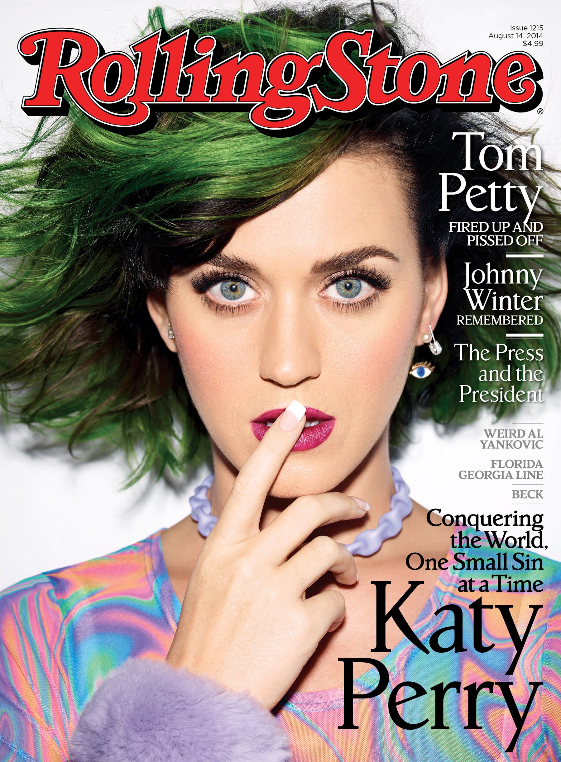 Close-up of Katy Perry with green hair on Rolling Stone magazine cover, finger to lips, wearing pastel top and choker necklace.