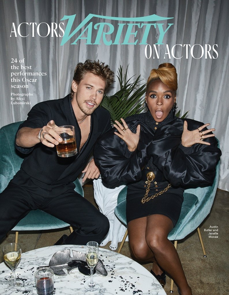 Actors Austin Butler and Janelle Monáe pose for the cover of Variety's 'Actors on Actors' issue, seated at a table with beverages and greenery.