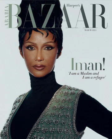 Magazine cover featuring Iman in a green beaded vest, black turtleneck, and high black hair, with text overlay and a light gray backdrop.