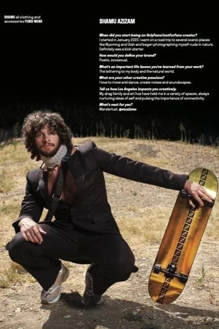 Man in suit crouching outdoors with skateboard. Fashion-forward pose, natural setting, unique style. Dark suit, light sneakers, editorial.