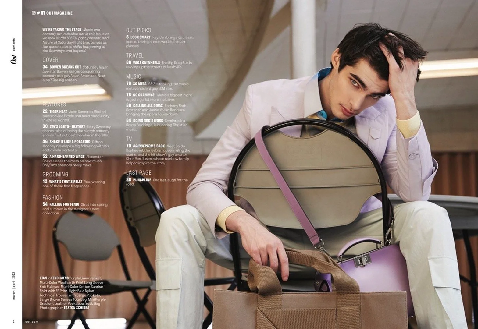 Fashion editorial portrait of a young adult male model in a light purple suit, seated on a chair with a handbag.