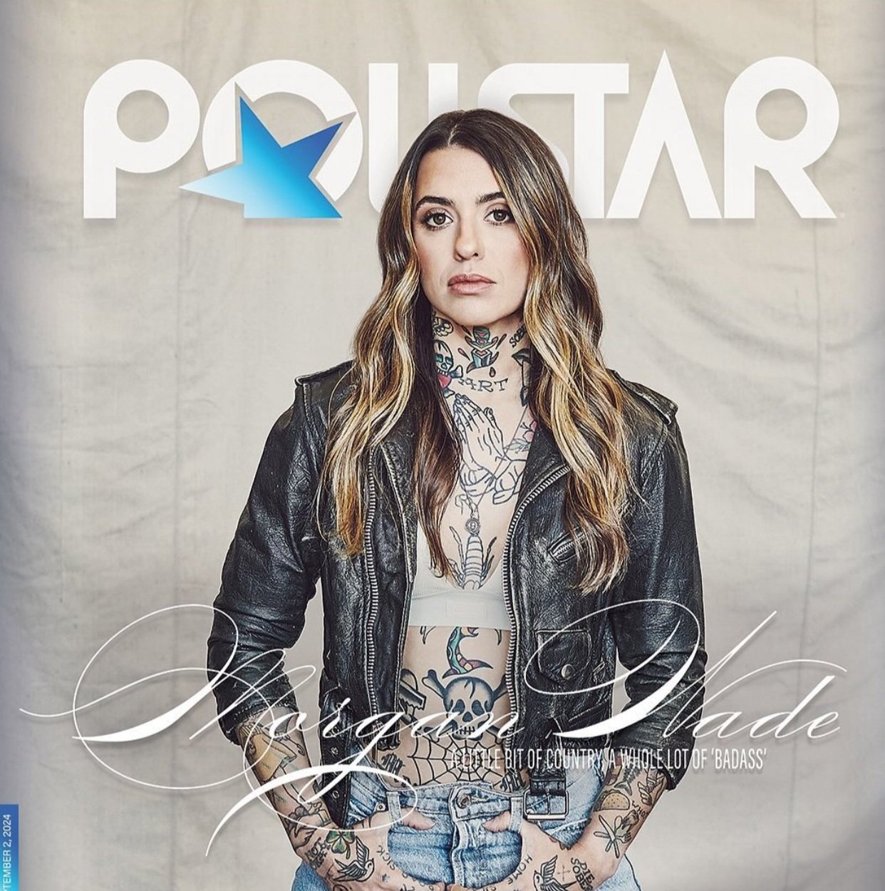 Singer Elle King poses for the cover of Pollstar. She is tattooed, wears a black leather jacket, and looks directly at the camera.