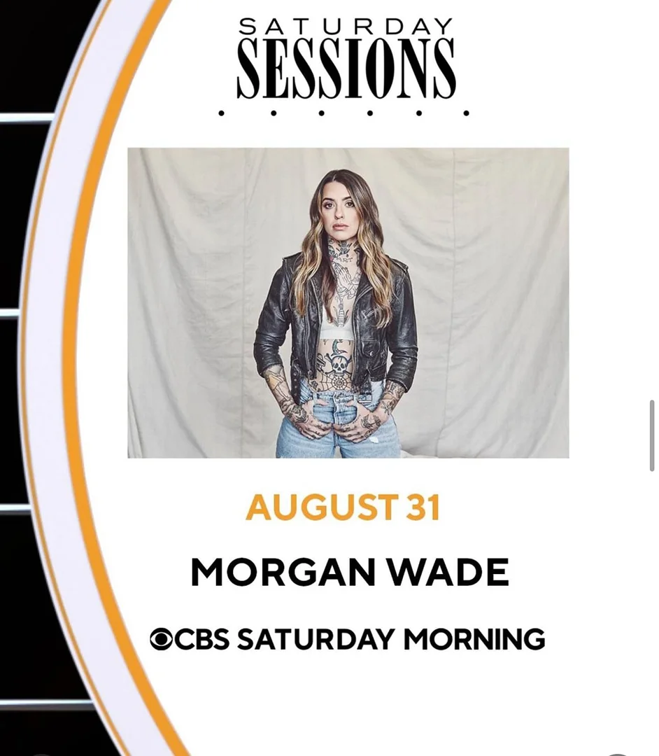 Morgan Wade poses in a promotional image for Saturday Sessions, wearing a black leather jacket and light wash jeans, with visible tattoos.