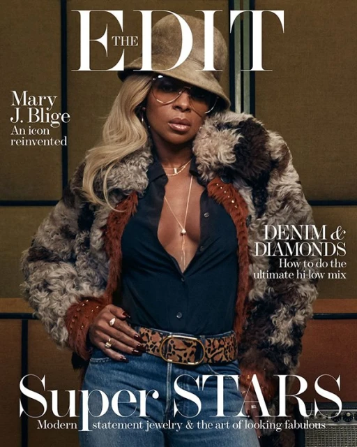 Mary J. Blige on the cover of The Edit magazine. She is wearing a fur coat, sunglasses, jeans, jewelry and a hat in a studio.
