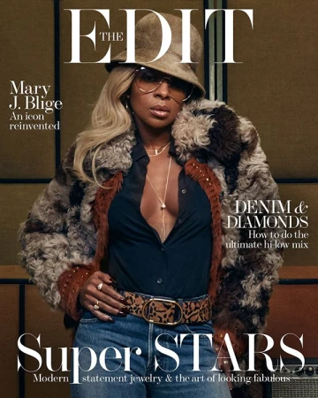 Mary J. Blige on the cover of The Edit magazine. She is wearing a fur coat, sunglasses, jeans, jewelry and a hat in a studio.