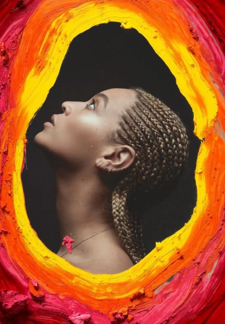 Profile shot of a woman with blonde braided hair and a red flower necklace looking upwards against a black background surrounded by painted frame.