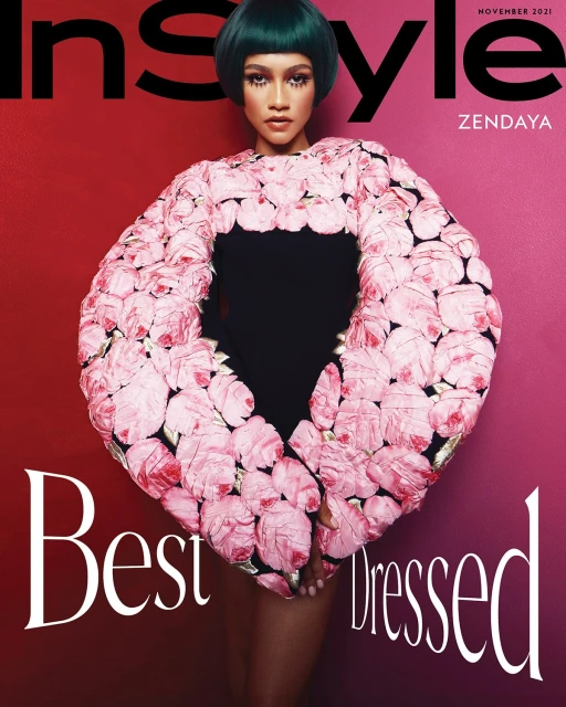 InStyle magazine cover featuring Zendaya, November 2021 issue. Zendaya wears a floral textured top. The background has red and pink tones.