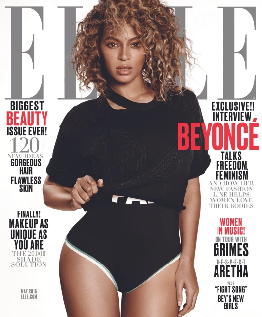 ELLE magazine cover featuring Beyoncé wearing a black top and high-waisted bottoms, promoting beauty issue, and interviews on freedom and feminism.