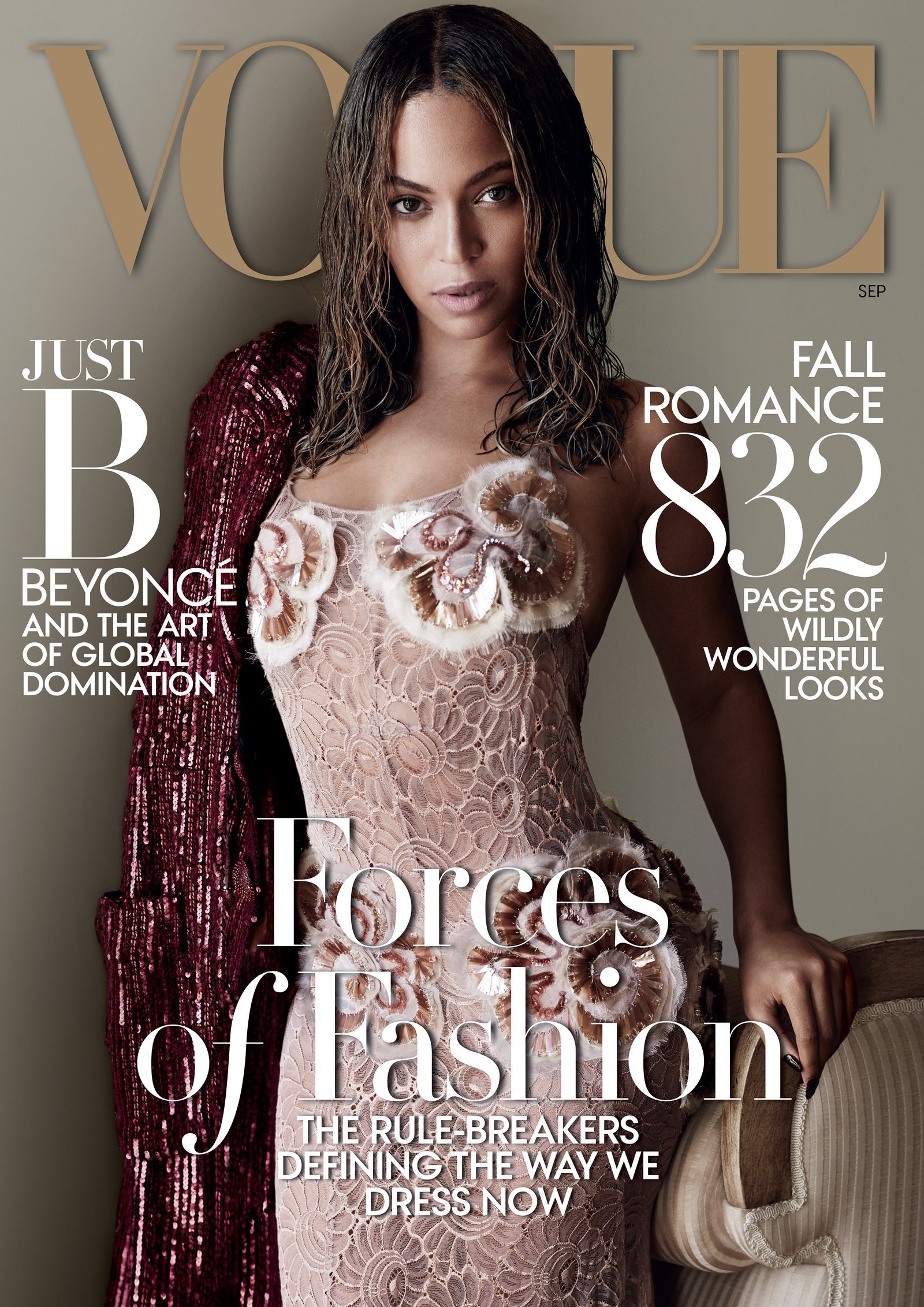 Vogue magazine cover featuring a woman with wet-look hair wearing a pale embellished dress with a sequined jacket draped on her shoulder.
