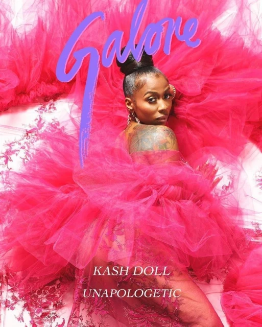 Portrait of an adult woman with a high bun posing in a pink, layered tulle dress. The image is an album cover for "Kash Doll".