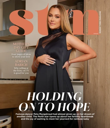 Magazine cover featuring a pregnant Peta Murgatroyd in a black dress, with the magazine title 'STM' in peach letters above her head.