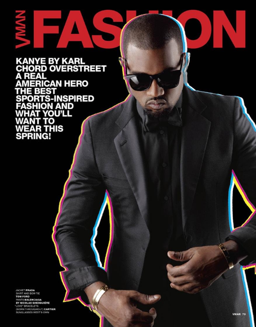 VMAN Fashion magazine cover featuring Kanye West wearing a black suit and sunglasses against a dark background with colorful text.