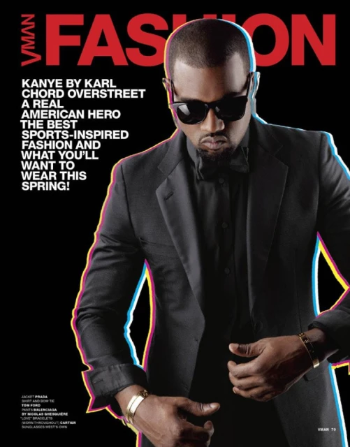 VMAN Fashion magazine cover featuring Kanye West wearing a black suit and sunglasses against a dark background with colorful text.