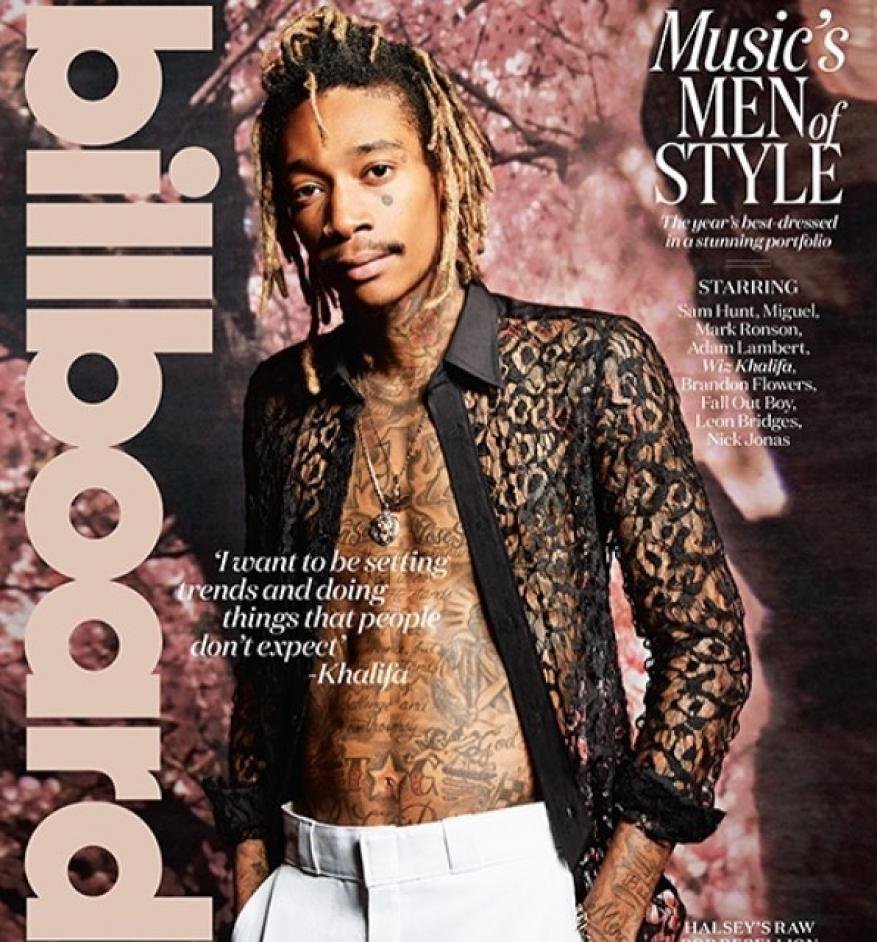 Billboard magazine cover featuring Wiz Khalifa, showcasing music, men's fashion, and celebrity culture in a posed portrait.