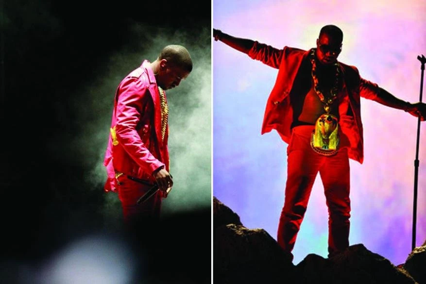 Performance shot of Kanye West wearing a red suit and gold chain. One scene is against black smoke, the other is against a blue sky.