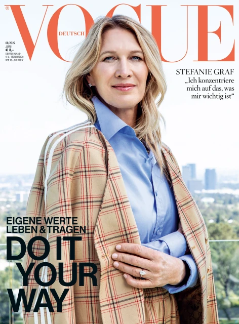 Vogue cover featuring Stefanie Graf in a tan plaid blazer and light blue shirt against a soft outdoor background.