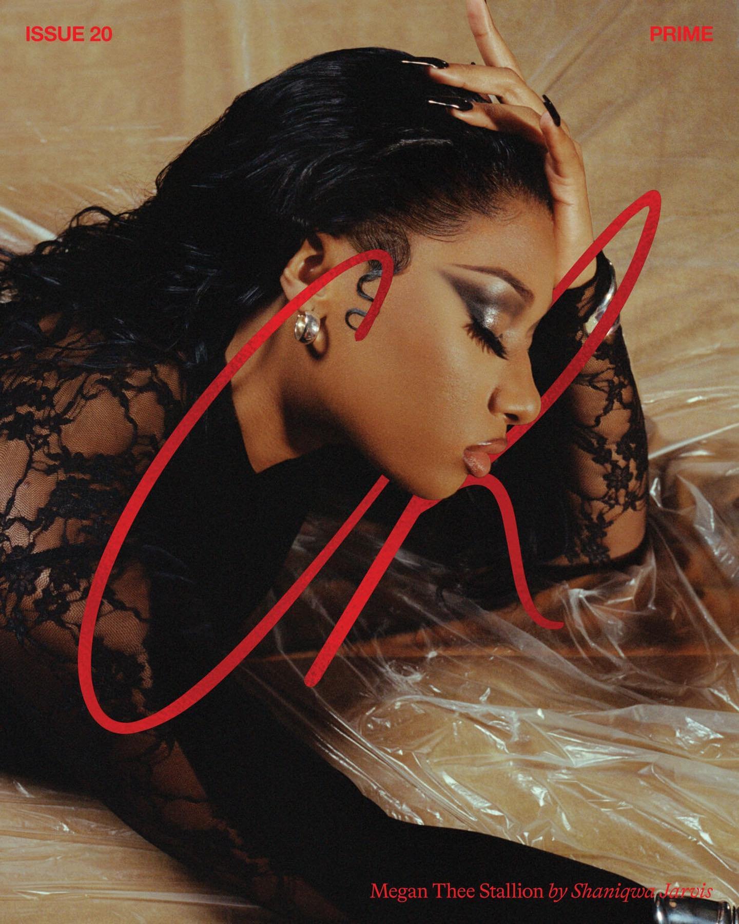 Magazine cover featuring a Black woman in a lace top with dark hair lying on plastic, makeup accentuates her eyes, shot in studio.