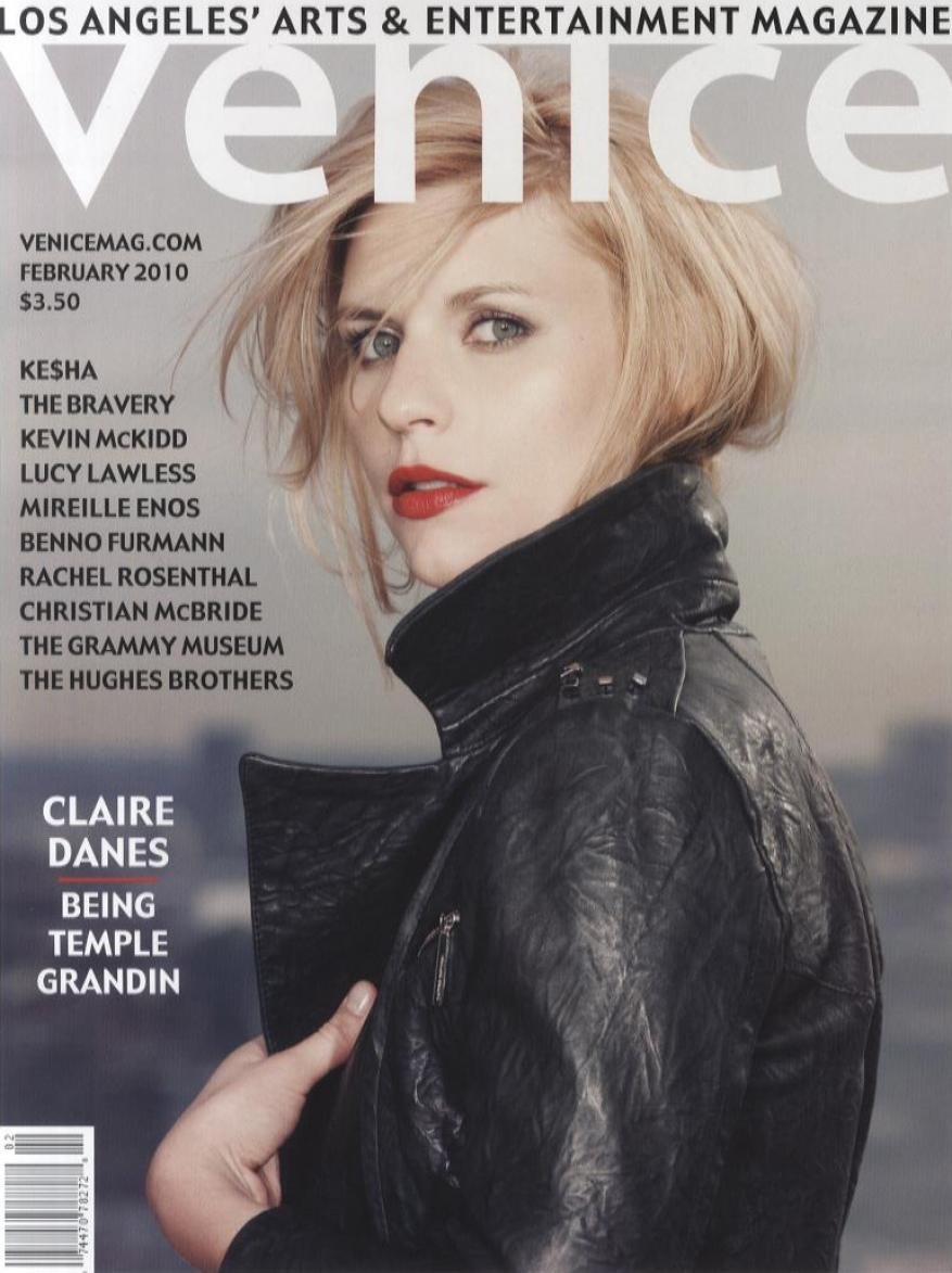 Magazine cover featuring actress Claire Danes wearing a black leather jacket against an urban skyline background.