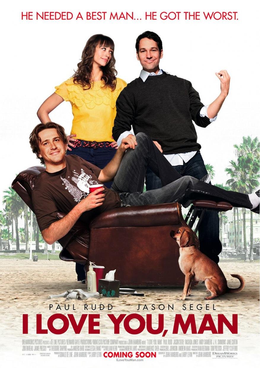 Movie poster for 'I Love You, Man' features Paul Rudd, Jason Segel, and Rashida Jones with a dog on a beach, promoting the comedy film.