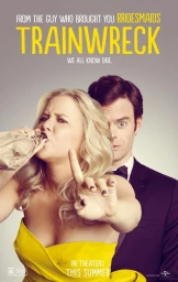 Amy Schumer drinking from a paper bag with Bill Hader peeking from behind against a grey backdrop