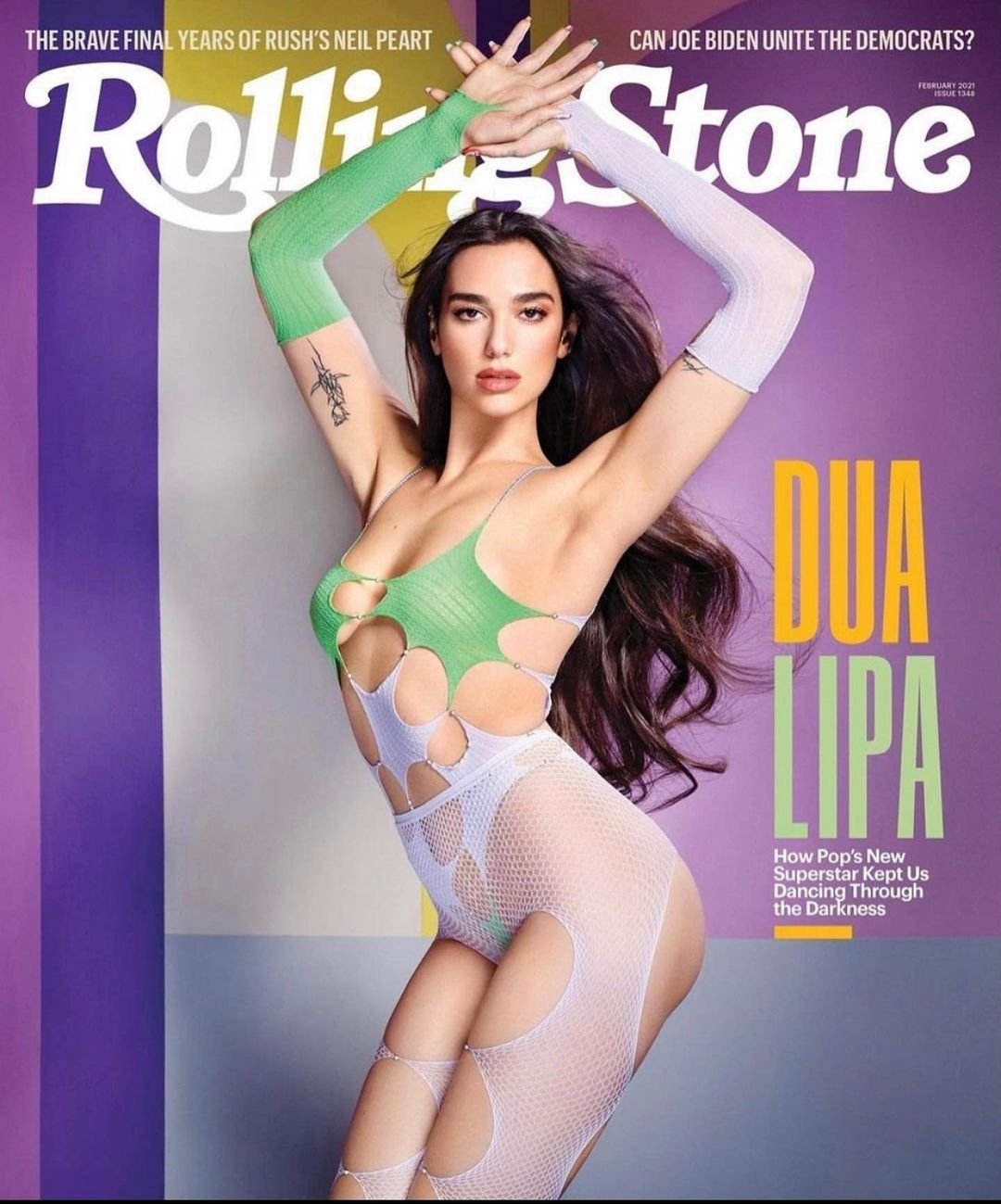 Dua Lipa graces the cover of Rolling Stone magazine. She's in a cutout bodysuit with a purple color block background. February 2024 issue.