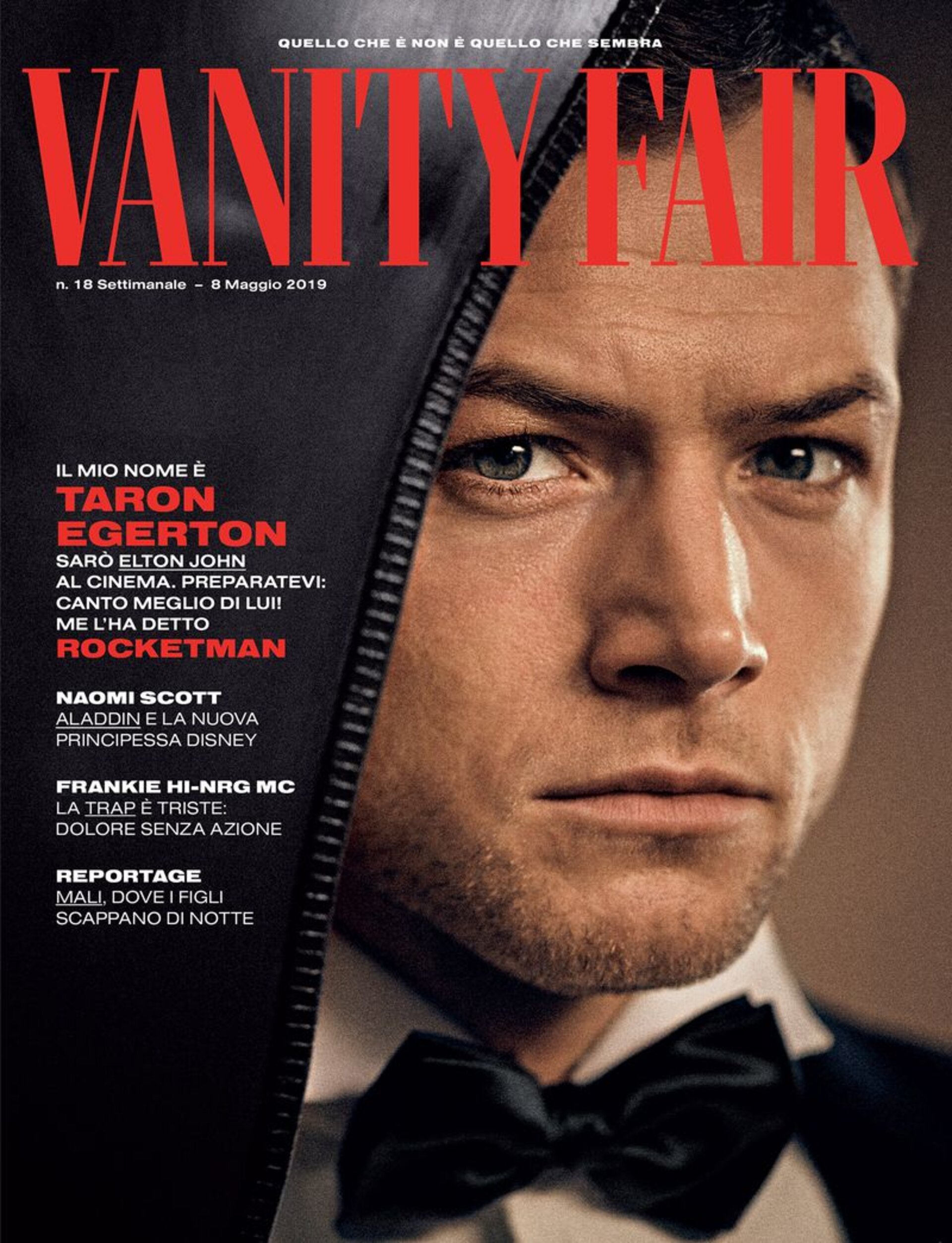 Vanity Fair magazine cover featuring Taron Egerton in a close-up shot, wearing a bow tie with partial black leather jacket.
