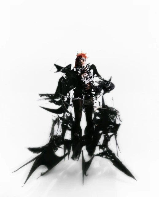 An adult stands surrounded by abstract black structures, creating a unique and artistic visual statement against a bright white backdrop.