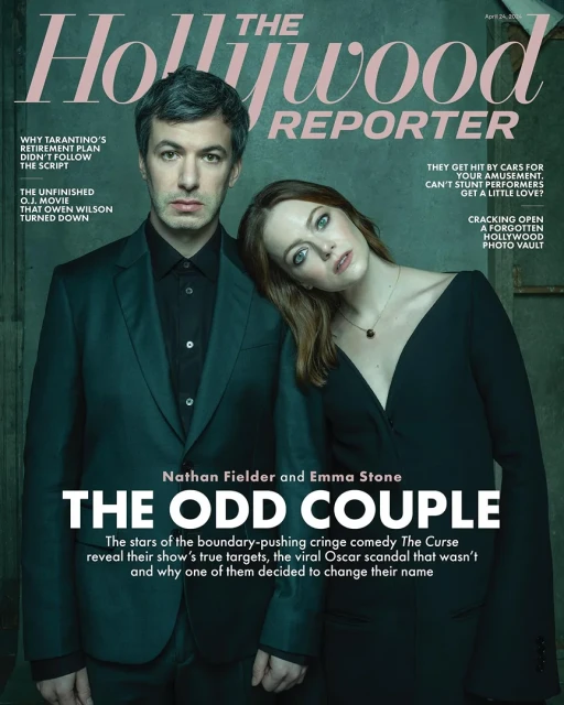 Magazine cover featuring Nathan Fielder and Emma Stone. The Hollywood Reporter cover features the actors in dark clothing, posed closely together.